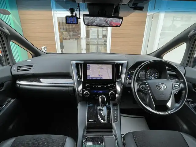 トヨタ アルファードハイブリット S タイプゴールド 宮崎県 2021(令3)年 5万km ホワイトパールクリスタルシャイン 純正ナビ/メモリナビ/ワンオーナー/バックカメラ/フリップダウンモニター/オットマン/クルーズコントロール/プッシュスタート/両側パワースライドドア/ETC/ブラインドスポットモニター/パーキングサポートブレーキ/デジタルインナーミラー/純正17インチアルミ