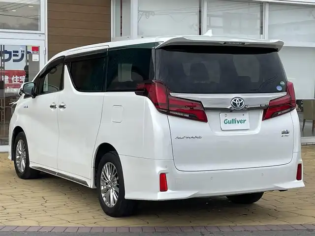 トヨタ アルファードハイブリット S タイプゴールド 宮崎県 2021(令3)年 5万km ホワイトパールクリスタルシャイン 純正ナビ/メモリナビ/ワンオーナー/バックカメラ/フリップダウンモニター/オットマン/クルーズコントロール/プッシュスタート/両側パワースライドドア/ETC/ブラインドスポットモニター/パーキングサポートブレーキ/デジタルインナーミラー/純正17インチアルミ