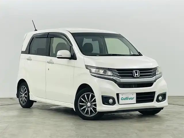 ホンダ Ｎ ＷＧＮ カスタム G Aパッケージ 三重県 2015(平27)年 7.9万km プレミアムホワイトパール シティブレーキアクティブシステム/純正メモリナビ/・型番:VXM-155VSi/・AM/FM/CD/DVD/BT/ワンセグ/・バックカメラ/・ETC/プッシュスタート/・スマートキー/HIDヘッドライト/・オートライト/・フォグランプ/革巻きステアリング/・ステアリングスイッチ/・チルト式ステアリング/ハーフレザーシート/純正フロアマット/ドアバイザー