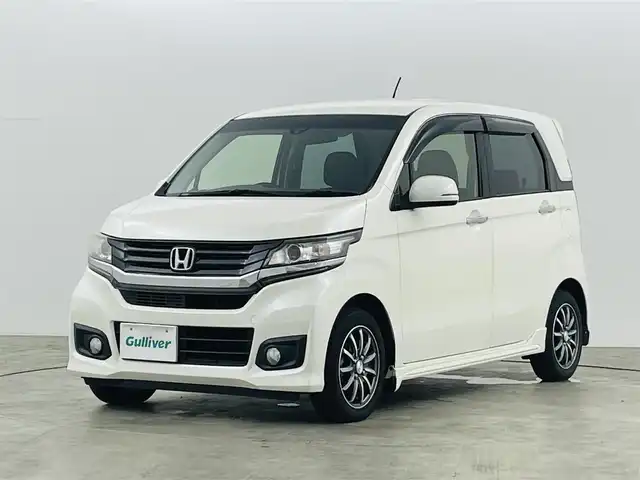 ホンダ Ｎ ＷＧＮ カスタム G Aパッケージ 三重県 2015(平27)年 7.9万km プレミアムホワイトパール シティブレーキアクティブシステム/純正メモリナビ/・型番:VXM-155VSi/・AM/FM/CD/DVD/BT/ワンセグ/・バックカメラ/・ETC/プッシュスタート/・スマートキー/HIDヘッドライト/・オートライト/・フォグランプ/革巻きステアリング/・ステアリングスイッチ/・チルト式ステアリング/ハーフレザーシート/純正フロアマット/ドアバイザー