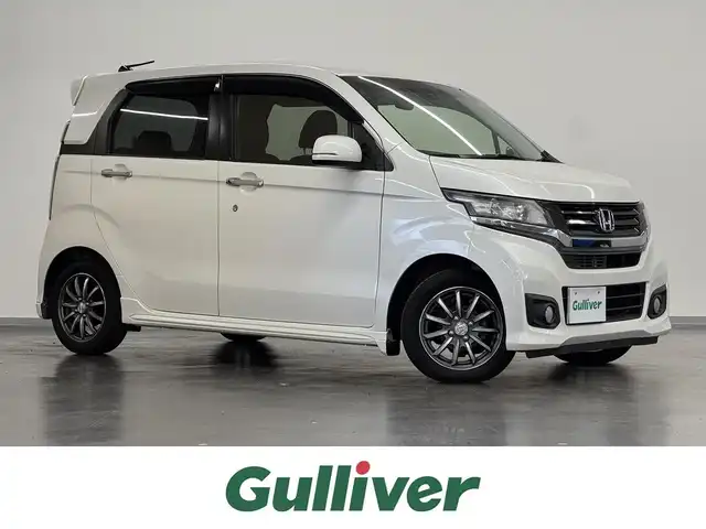 ホンダ Ｎ ＷＧＮ カスタム G Aパッケージ 三重県 2015(平27)年 7.9万km プレミアムホワイトパール ガソリン/FF/インパネCVT/純正 7インチナビ VXM-155VSi/（FM/AM/CD/DVD/USB/iPod/SD/Bluetooth/地デジTV/VTR/AUX）/バックカメラ/ETC/安全/・CTBA: シティブレーキアクティブシステム（低速域衝突軽減ブレーキ）/・VSA（ABS・トラクションコントロール・横すべり抑制）/・SRS サイド＆カーテンエアバッグ/装備/・ハーフレザーシート/・クルーズコントロール/・オートエアコン/・オートライト/・ディスチャージヘッドライト（HID）/・フロントフォグランプ/・ステアリングスイッチ/・後席シートベルトインジケータ/・プッシュスタート/・スマートキーx2/・純正14inAW/・保/取/ナビ取/など