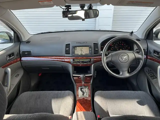 トヨタ アリオン A18 Sパッケージ 高知県 2005(平17)年 9.1万km シルバーM 純正ナビワイルドマルチAVステーション/ドライブレコーダー/ETC/リモコンキー/バックカメラ/スペアキー/リモコンキー/純正フロアマット/純正15インチアルミホイール/オートライト/キセノンヘッドライト/運転席＋助手席エアバッグ/AM/FM/本革巻きステアリング