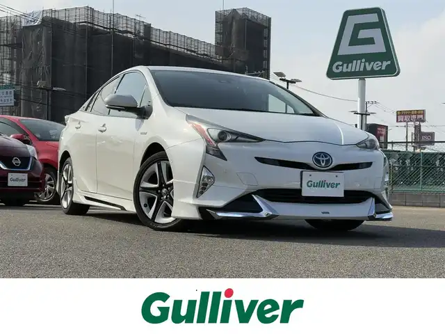 トヨタ プリウス A ツーリングセレクション 大分県 2017(平29)年 8.9万km ホワイトパールクリスタルシャイン ・ナビ(CD/DVD/BT/SD)/・バックカメラ/・フルセグテレビ/・プリクラッシュセーフティ/・ヘッドアップディスプレイ/・モデリスタ/・レーダークルーズコントロール/・オートハイビーム/・パーキングアシスト/・ETC/・ドライブレコーダー/・シートヒーター/・テレビキャンセラー/・スマートキー/・プッシュスタートボタン