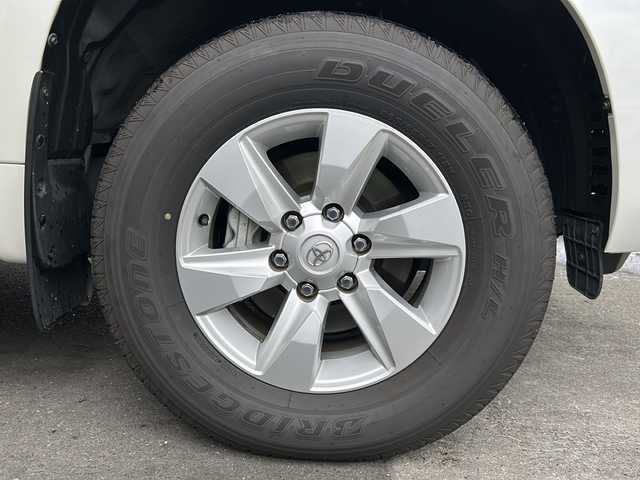 トヨタ ランドクルーザー プラド TX Lパッケージ 京都府 2020(令2)年 1.6万km ホワイトパールクリスタルシャイン ワンオーナー　/黒本革シート　/純正８インチＳＤナビ　/フルセグＴＶ　/CD/DVD再生機能/Bluetooth/禁煙　/ＬＤＡ　/ＰＣＳ　/ルーフレール　/レーダークルーズコントロール/４ＷＤ　/ダウンヒルアシストコントロール/センターデフロック/パーキングアシスト/ＬＥＤヘッドライト/ウィンカーミラー/オートライト/オートマチックハイビーム/パワーシート　/電動格納サードシート　/シートヒーター　/エアシート　/フルフラットシート/ベンチシート/純正17インチＡＷ/ステアリングスイッチ/Wエアバッグ/カーテンエアバッグ/前後社外ドライブレコーダー(TZ-D205W)