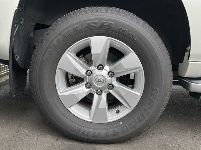 トヨタ ランドクルーザー プラド TX Lパッケージ 京都府 2020(令2)年 1.6万km ホワイトパールクリスタルシャイン ワンオーナー　/黒本革シート　/純正８インチＳＤナビ　/フルセグＴＶ　/CD/DVD再生機能/Bluetooth/禁煙　/ＬＤＡ　/ＰＣＳ　/ルーフレール　/レーダークルーズコントロール/４ＷＤ　/ダウンヒルアシストコントロール/センターデフロック/パーキングアシスト/ＬＥＤヘッドライト/ウィンカーミラー/オートライト/オートマチックハイビーム/パワーシート　/電動格納サードシート　/シートヒーター　/エアシート　/フルフラットシート/ベンチシート/純正17インチＡＷ/ステアリングスイッチ/Wエアバッグ/カーテンエアバッグ/前後社外ドライブレコーダー(TZ-D205W)