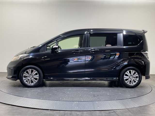 ホンダ フリード Gエアロ 愛媛県 2013(平25)年 9.2万km プレミアムスパークルブラックパール 社外ナビ/Bluetooth/フルセグ/バックカメラ/両側電動スライドドア/LEDヘッドライト/オートライト/ドライブレコーダー/ETC/ステアリングスイッチ/純正15インチアルミ/盗難防止装置/純正フロアマット/電動格納ミラー/スマートキー