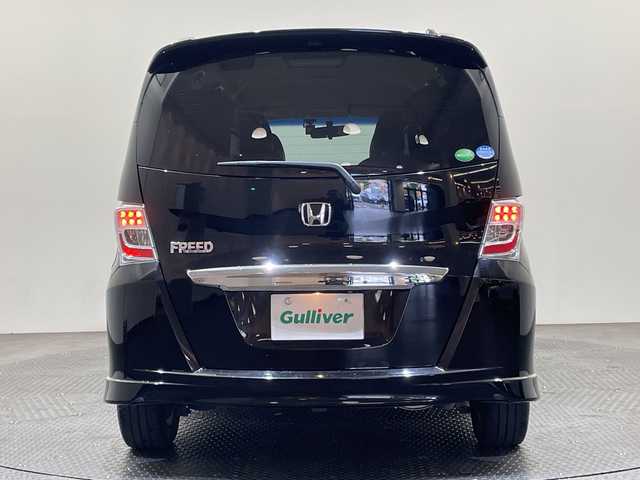 ホンダ フリード Gエアロ 愛媛県 2013(平25)年 9.2万km プレミアムスパークルブラックパール 社外ナビ/Bluetooth/フルセグ/バックカメラ/両側電動スライドドア/LEDヘッドライト/オートライト/ドライブレコーダー/ETC/ステアリングスイッチ/純正15インチアルミ/盗難防止装置/純正フロアマット/電動格納ミラー/スマートキー