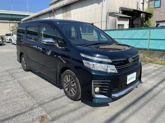 トヨタ ヴォクシー ZS 煌 福岡県 2015(平27)年 13.8万km ブラッキッシュアゲハガラスフレーク ALPINEナビ(TV/DVD/CD/BT)バックモニタABS両側パワースライドドア前後ドライブレコーダーETCUSB純正フロアマット純正アルミホイールプッシュスタートスマートキースペアキー×1