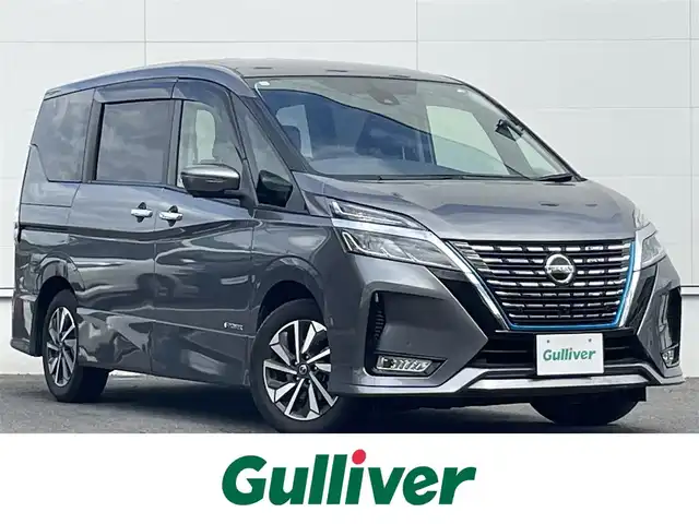 日産 セレナ e－パワー ハイウェイスター V 佐賀県 2020(令2)年 6.6万km ダークメタルグレー 7人乗り/プロパイロット/エマージェンシーブレーキ/インテリジェントクルーズコントロール/車線逸脱警報/車線逸脱防止支援/側方支援/後側方支援/前後ソナー/パーキングアシスト/純正10型SDナビ/・アラウンドビューカメラ/・フルセグTV/BT/CD/DVD/純正後席モニター/両側パワースライドドア/純正16インチAW/純正前方ドラレコ(DH5－D)/LEDヘッドライト/フォグランプ/オートライト/ETC/電動パーキングスイッチ/取扱説明書/保証書