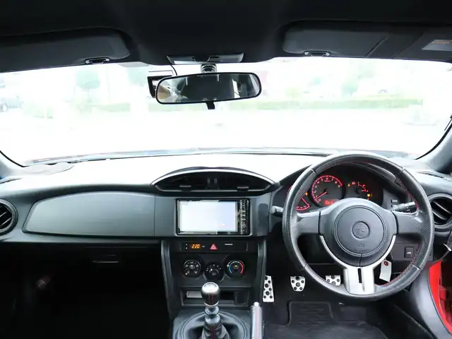 トヨタ ８６ G 神奈川県 2012(平24)年 5.7万km ライトニングレッド 6速マニュアル/ドラレコ/ETC/バックカメラ/社外メモリナビ/Buletoothオーディオ/DVD/CD/フルセグテレビ/純正16インチAW/純正フロアマット/純正ヘッドライト