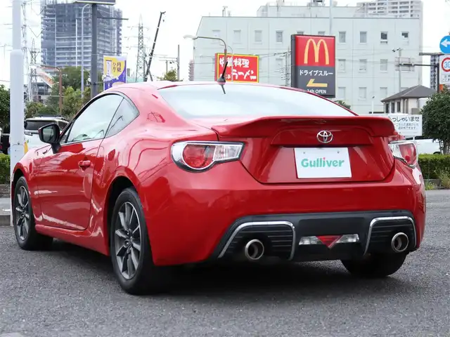 トヨタ ８６ G 神奈川県 2012(平24)年 5.7万km ライトニングレッド 6速マニュアル/ドラレコ/ETC/バックカメラ/社外メモリナビ/Buletoothオーディオ/DVD/CD/フルセグテレビ/純正16インチAW/純正フロアマット/純正ヘッドライト