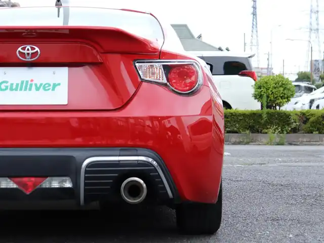 トヨタ ８６ G 神奈川県 2012(平24)年 5.7万km ライトニングレッド 6速マニュアル/ドラレコ/ETC/バックカメラ/社外メモリナビ/Buletoothオーディオ/DVD/CD/フルセグテレビ/純正16インチAW/純正フロアマット/純正ヘッドライト