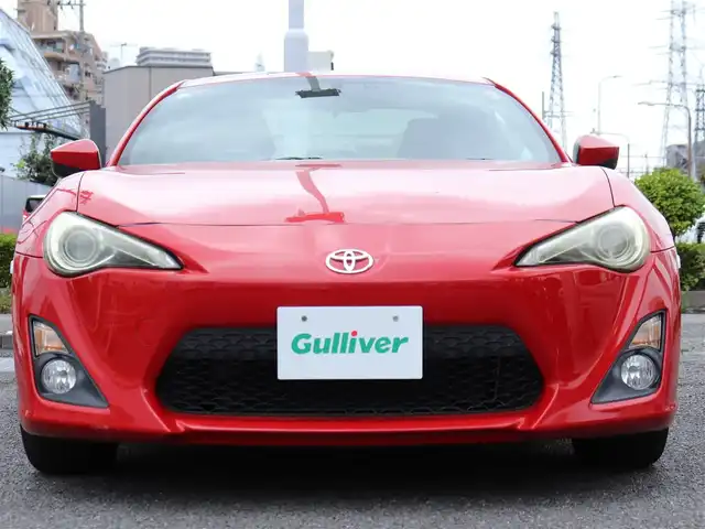 トヨタ ８６ G 神奈川県 2012(平24)年 5.7万km ライトニングレッド 6速マニュアル/ドラレコ/ETC/バックカメラ/社外メモリナビ/Buletoothオーディオ/DVD/CD/フルセグテレビ/純正16インチAW/純正フロアマット/純正ヘッドライト