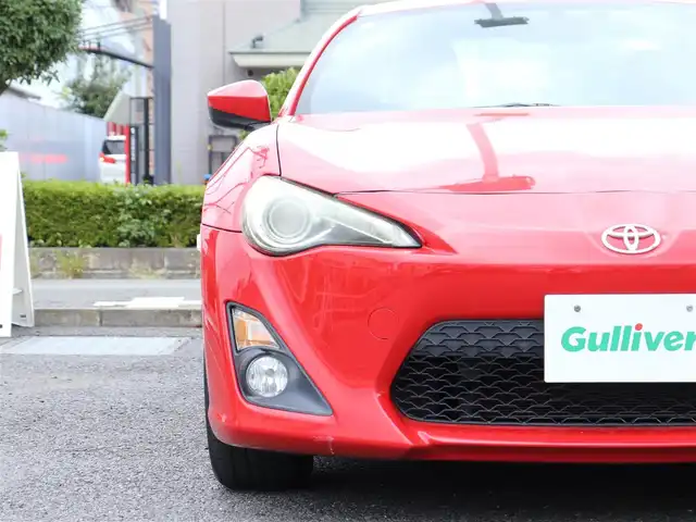 トヨタ ８６ G 神奈川県 2012(平24)年 5.7万km ライトニングレッド 6速マニュアル/ドラレコ/ETC/バックカメラ/社外メモリナビ/Buletoothオーディオ/DVD/CD/フルセグテレビ/純正16インチAW/純正フロアマット/純正ヘッドライト