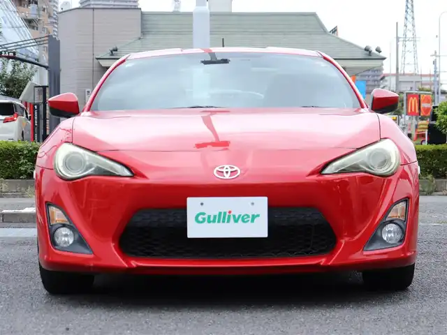 トヨタ ８６ G 神奈川県 2012(平24)年 5.7万km ライトニングレッド 6速マニュアル/ドラレコ/ETC/バックカメラ/社外メモリナビ/Buletoothオーディオ/DVD/CD/フルセグテレビ/純正16インチAW/純正フロアマット/純正ヘッドライト