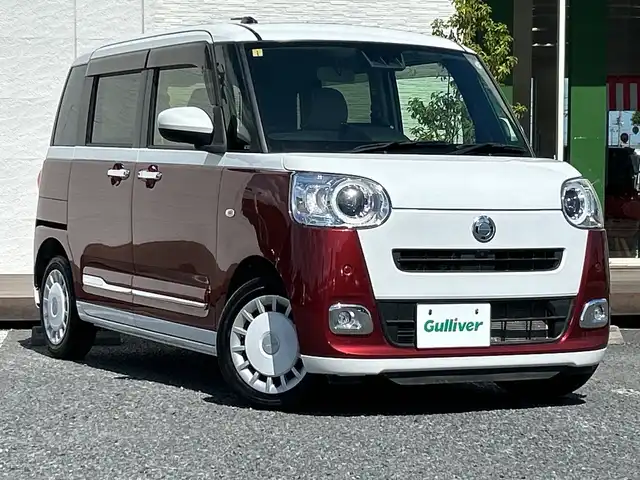 ダイハツ ムーヴ キャンバス ストライプス G ターボ 千葉県 2023(令5)年 2.1万km シャイニングホワイトパール/ファイアークォーツレッドメタリック ナビ　全方位カメラ　両側電動スライドドア　ホッとカップホルダー　ＥＴＣ　レーダークルコン　フルセグ　Ｂｔ　USB シートヒーター　スマートキー ＬＥＤライト　オートライト　コーナーセンサー