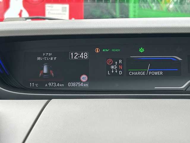 ホンダ フリード ハイブリット G ホンダセンシング 広島県 2022(令4)年 3.9万km プラチナホワイトパール 禁煙/純正Gathersナビ/（Bluetooth/CD/IPod/SD）/ホンダセンシング/・衝突軽減ブレーキ/・路外逸脱抑制機能/・車線維持支援システム/・アダプティブクルーズコントロール/・歩行者事故低減ステアリング/・誤発進抑制機能/・後方誤発進抑制機能/・標識認識機能/・先行者発進お知らせ機能/両側パワースライドドア/バックカメラ/LEDヘッドライト/オートリトラミラー/三列シート/ウォークスルー/純正フロアマット/純正前後ドライブレコーダー/前席シートヒーター