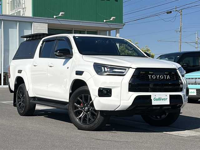 トヨタ ハイラックス Z GRスポーツ 香川県 2022(令4)年 8.1万km スーパーホワイトⅡ  ワンオーナー/ 4WDディーゼルターボ/ GRスポーツ専用ハーフレザーシート/・　D席パワーシート/ プリクラッシュセーフティ/ レーンディパーチャーアラート/ クリアランスソナー/ バックソナー/ ダウンヒルアシストコントロール/ オートLSD/ リアデフロック/ 純正ディスプレイオーディオ/・　ナビ/・　パノラミックビューモニター/・　BT接続/ ETC/ 社外レーダー探知機/ ミラー型前後ドラレコ/ サイドステップ/ USB接続/ LEDヘッドライト/ フォグライト/ 純正フロアマット/ ドアバイザー/ スマートキー２個/ 新車時保証書