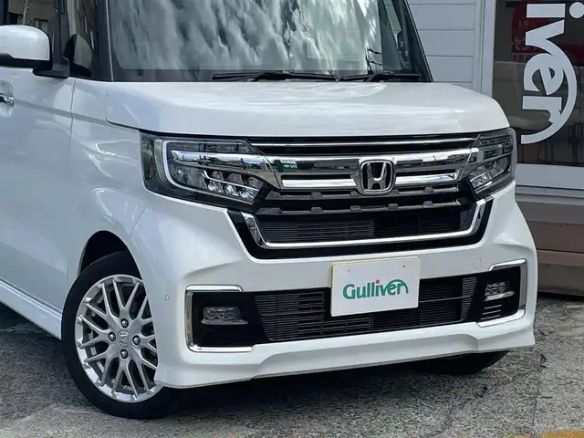 ホンダ Ｎ ＢＯＸ カスタム L ターボ 神奈川県 2023(令5)年 1.3万km プラチナホワイトパール ワンオーナー/社外メモリナビ/　（CD・DVD・Bluetooth・USB）/フルセグTV/両側パワースライドドア/ホンダセンシング/アダプティブクルーズコントロール/前後コーナーセンサー/ハーフレザーシート/前席シートヒーター/LEDヘッドライト/LEDフォグライト/スマートキー×2/ETC/保証書/取扱説明書