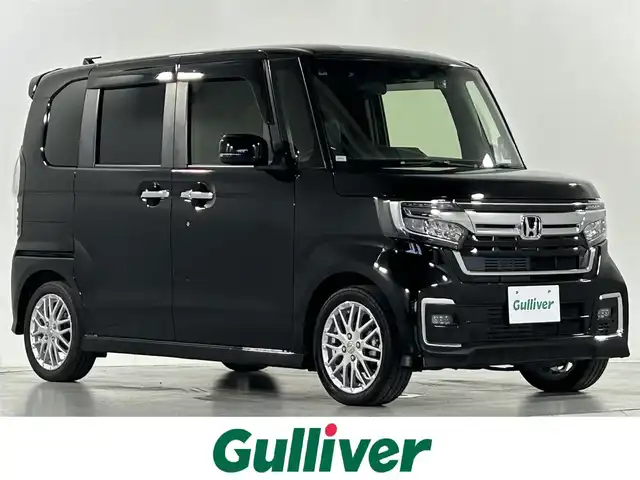 ホンダ Ｎ ＢＯＸ カスタム L ターボ 佐賀県 2021(令3)年 5万km クリスタルブラックパール 純正8インチGathersナビ/フルセグTV/DVD/CD/Bluetooth/バックカメラ/衝突被害軽減システム/レーダークルーズコントロール/レーンアシスト/ロードサインアシスト/オートライト/オートマチックハイビーム/LEDヘッドライト/LEDフォグライト/前方ドライブレコーダー/ビルトインETC/両側パワースライドドア/クリアランスソナー/運転席・助手席シートヒーター/ハーフレザーシート/パドルシフト/後席サンシェード/シートバックテーブル/ISOFIX対応シート/チップアップシート/純正15インチアルミホイール/純正フロアマット
