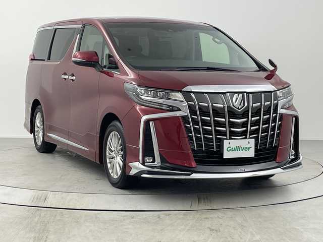 トヨタ アルファード S Cパッケージ 熊本県 2021(令3)年 5.3万km ダークレッドマイカメタリック 禁煙車/９型ナビ　/フルセグ/Ｂｌｕｅｔｏｏｔｈ/ＤＶＤ　/バックカメラ　/１２型後席モニター　/モデリスタフルエアロ（フロント・サイド・リア）　/トヨタセーフティセンス　/・衝突被害軽減ブレーキ　/・車線逸脱警報　/・レーダークルーズコントロール/三眼LEDヘッドライト/ワイヤレス充電/ビルトインETC/DN席シートヒーター/ベンチレーション/DN席パワーシート/シートメモリー/ステアリングヒーター/オートマチックハイビーム