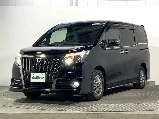 トヨタ エスクァイア Gi ブラックテーラード 大阪府 2016(平28)年 3.4万km ブラック 社外エアロ 社外ナビ(フルセグ/DVD再生/Bluetooth) 衝突軽減 後席モニター 両側パワースライドドア バックカメラ ETC トヨタセーフティセンス クルコン ハーフレザー シートヒーター