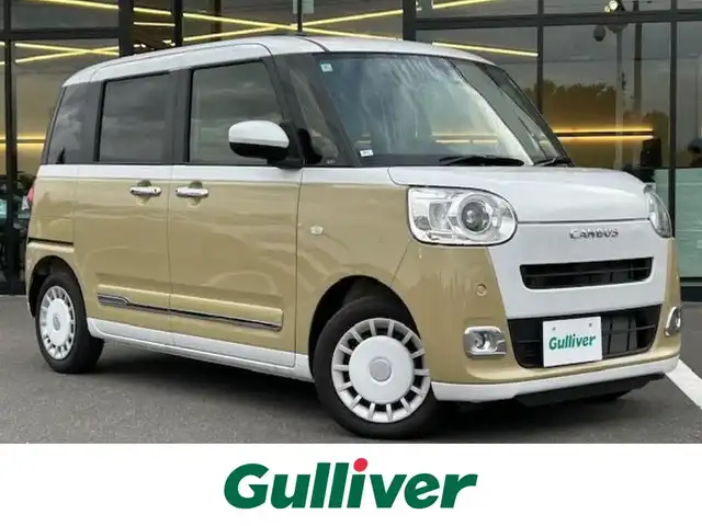 ダイハツ ムーヴ キャンバス ストライプス G 栃木県 2024(令6)年 0.1万km シャイニングホワイトパール/サンドベージュメタリック スマートアシスト/・衝突回避支援ブレーキ機能/・ブレーキ制御付誤発進抑制機能/・車線逸脱抑制制御機能/・路側逸脱警報機能/・先行車発進お知らせ機能/・標識認識機能/・アダプティブドライビングビーム/社外メモリナビ/フルセグTV/DVD/Bluetooth/バックカメラ/両側パワースライドドア/スマートキー/シートヒーター/保温機能付カップホルダー/ステアリングリモコン/純正フロアマット/LEDヘッドライト/フォグランプ/オートライト/コーナーセンサー