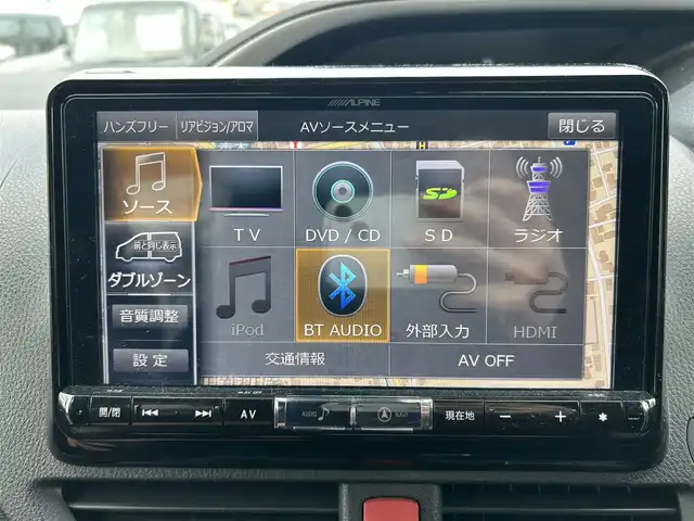 トヨタ ヴォクシー ハイブリッド ZS 煌 福岡県 2018(平30)年 7.7万km ブラック 社外９型ナビ/（AM/FM/CD/DVD/BT)/フルセグTV/バックカメラ/両側パワースライドドア /純正フリップダウンモニター/クルーズコントロール/ビルトインETC/スマートキー/プッシュスタート/前席シートヒーター /プリクラッシュ セーフティ/レーンキープアシスト/横滑り防止装置/純正１６インチAW/LEDヘッドライト/フロアマット/取り扱い説明書/保証書
