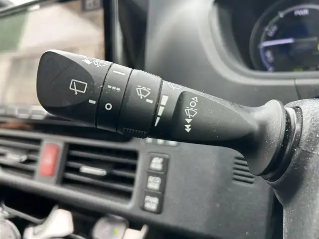 トヨタ ヴォクシー ハイブリッド ZS 煌 福岡県 2018(平30)年 7.7万km ブラック 社外９型ナビ/（AM/FM/CD/DVD/BT)/フルセグTV/バックカメラ/両側パワースライドドア /純正フリップダウンモニター/クルーズコントロール/ビルトインETC/スマートキー/プッシュスタート/前席シートヒーター /プリクラッシュ セーフティ/レーンキープアシスト/横滑り防止装置/純正１６インチAW/LEDヘッドライト/フロアマット/取り扱い説明書/保証書