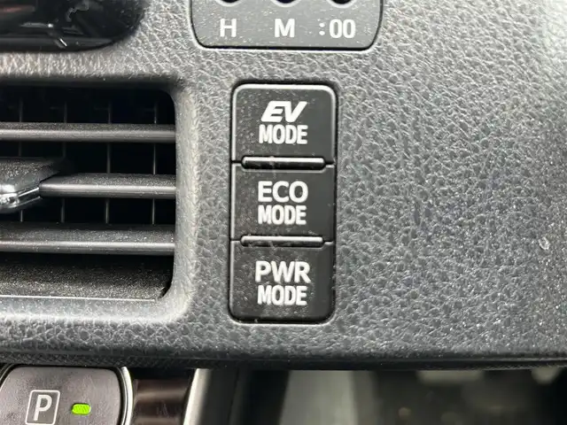 トヨタ ヴォクシー ハイブリッド ZS 煌 福岡県 2018(平30)年 7.7万km ブラック 社外９型ナビ/（AM/FM/CD/DVD/BT)/フルセグTV/バックカメラ/両側パワースライドドア /純正フリップダウンモニター/クルーズコントロール/ビルトインETC/スマートキー/プッシュスタート/前席シートヒーター /プリクラッシュ セーフティ/レーンキープアシスト/横滑り防止装置/純正１６インチAW/LEDヘッドライト/フロアマット/取り扱い説明書/保証書