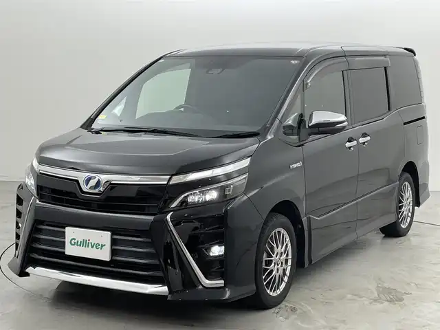 トヨタ ヴォクシー ハイブリッド ZS 煌 福岡県 2018(平30)年 7.8万km ブラック 社外９型ナビ（ＢＴ，フルセグＴＶ）　/バックカメラ　/ビルトインＥＴＣ　/クルーズコントロール　/衝突軽減ブレーキ　/レーンキープ　/両側電動スライドドア　/シートヒーター　/Ｗエアコン　/純正１６インチＡＷ　/ＬＥＤ