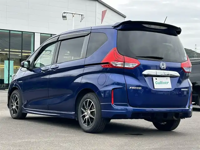 ホンダ フリード ハイブリット G 鹿児島県 2016(平28)年 7.9万km コバルトブルーパール サイドリフトアップシート車/社外ＳＤナビ/　　CD/DVD/BT/フルセグ/バックカメラ/両側パワースライドドア/クルーズコントロール/LEDヘッドライト/社外15インチアルミホイール/スマートキー/純正ビルトインETC/ステアリングスイッチ