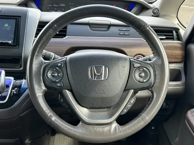 ホンダ フリード ハイブリット G 鹿児島県 2016(平28)年 7.9万km コバルトブルーパール サイドリフトアップシート車/社外ＳＤナビ/　　CD/DVD/BT/フルセグ/バックカメラ/両側パワースライドドア/クルーズコントロール/LEDヘッドライト/社外15インチアルミホイール/スマートキー/純正ビルトインETC/ステアリングスイッチ