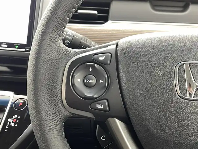 ホンダ フリード ハイブリット クロスター 熊本県 2022(令4)年 4.8万km プレミアムクリスタルレッドM 純正前後ドライブレコーダー　/純正フリップダウンモニター/純正9インチナビ（ＣＤ・ＤＶＤ・フルセグ・ＢＴ・ＳＤ・ApplCarPlay）/バックカメラ　/ビルトインＥＴＣ　/両側パワースライドドア　/後ろのみクリアランスソナー　/前席シートヒーター　/レーダークルーズコントロール/衝突軽減ブレーキ/先行車発進お知らせ機能/路外逸脱制御機能/標識認識機能/ハーフレザーシート/純正フロアマット/純正１５インチAW/オートライト/LEDヘッドライト/フォグランプ/スマートキー/プッシュスタート/スペアキー1本