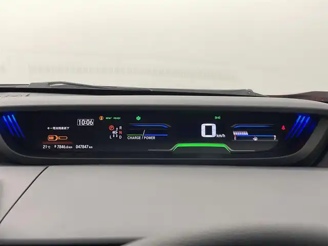 ホンダ フリード ハイブリット クロスター 熊本県 2022(令4)年 4.8万km プレミアムクリスタルレッドM 純正前後ドライブレコーダー　/純正フリップダウンモニター/純正9インチナビ（ＣＤ・ＤＶＤ・フルセグ・ＢＴ・ＳＤ・ApplCarPlay）/バックカメラ　/ビルトインＥＴＣ　/両側パワースライドドア　/後ろのみクリアランスソナー　/前席シートヒーター　/レーダークルーズコントロール/衝突軽減ブレーキ/先行車発進お知らせ機能/路外逸脱制御機能/標識認識機能/ハーフレザーシート/純正フロアマット/純正１５インチAW/オートライト/LEDヘッドライト/フォグランプ/スマートキー/プッシュスタート/スペアキー1本