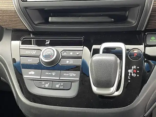 ホンダ フリード ハイブリット クロスター 熊本県 2022(令4)年 4.8万km プレミアムクリスタルレッドM 純正前後ドライブレコーダー　/純正フリップダウンモニター/純正9インチナビ（ＣＤ・ＤＶＤ・フルセグ・ＢＴ・ＳＤ・ApplCarPlay）/バックカメラ　/ビルトインＥＴＣ　/両側パワースライドドア　/後ろのみクリアランスソナー　/前席シートヒーター　/レーダークルーズコントロール/衝突軽減ブレーキ/先行車発進お知らせ機能/路外逸脱制御機能/標識認識機能/ハーフレザーシート/純正フロアマット/純正１５インチAW/オートライト/LEDヘッドライト/フォグランプ/スマートキー/プッシュスタート/スペアキー1本