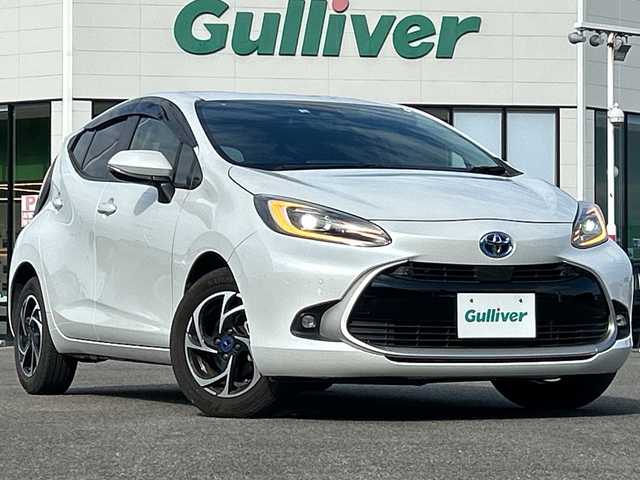 トヨタ アクア Z 佐賀県 2022(令4)年 5.5万km プラチナホワイトパールマイカ 純正10.5インチディスプレイオーディオ/モデリスタ15インチアルミホイール/バックカメラ/ビルトインETC/レーダークルーズコントロール/クリアランスソナー/プリクラッシュセーフティセンス/パーキングサポートブレーキ/ハーフレザーシート/前席シートヒーター/運転席シートヒーター/ステアリングヒーター/LEDヘッドライト/フォグランプ/AC100V