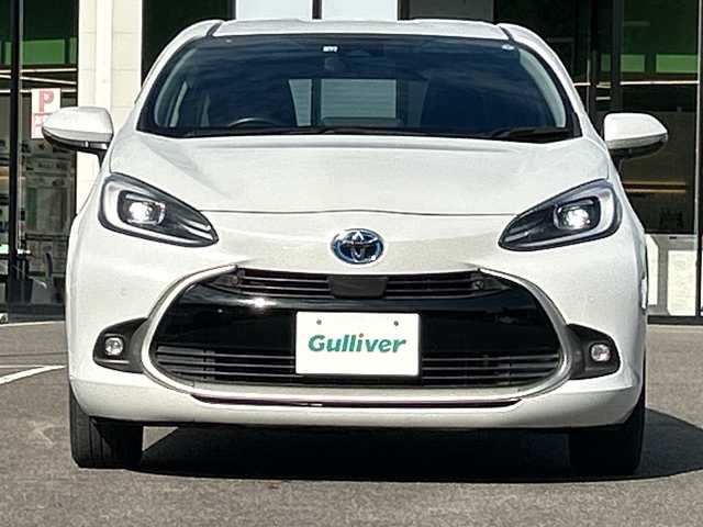 トヨタ アクア Z 佐賀県 2022(令4)年 5.5万km プラチナホワイトパールマイカ 純正10.5インチディスプレイオーディオ/モデリスタ15インチアルミホイール/バックカメラ/ビルトインETC/レーダークルーズコントロール/クリアランスソナー/プリクラッシュセーフティセンス/パーキングサポートブレーキ/ハーフレザーシート/前席シートヒーター/運転席シートヒーター/ステアリングヒーター/LEDヘッドライト/フォグランプ/AC100V