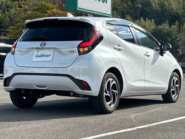 トヨタ アクア Z 佐賀県 2022(令4)年 5.5万km プラチナホワイトパールマイカ 純正10.5インチディスプレイオーディオ/モデリスタ15インチアルミホイール/バックカメラ/ビルトインETC/レーダークルーズコントロール/クリアランスソナー/プリクラッシュセーフティセンス/パーキングサポートブレーキ/ハーフレザーシート/前席シートヒーター/運転席シートヒーター/ステアリングヒーター/LEDヘッドライト/フォグランプ/AC100V