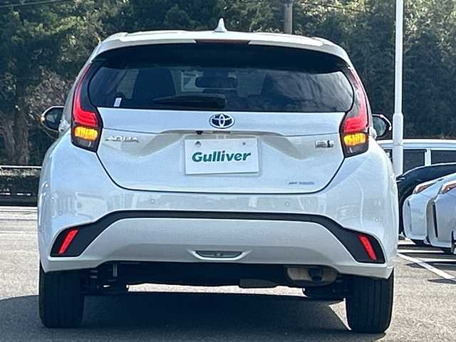 トヨタ アクア Z 佐賀県 2022(令4)年 5.5万km プラチナホワイトパールマイカ 純正10.5インチディスプレイオーディオ/モデリスタ15インチアルミホイール/バックカメラ/ビルトインETC/レーダークルーズコントロール/クリアランスソナー/プリクラッシュセーフティセンス/パーキングサポートブレーキ/ハーフレザーシート/前席シートヒーター/運転席シートヒーター/ステアリングヒーター/LEDヘッドライト/フォグランプ/AC100V