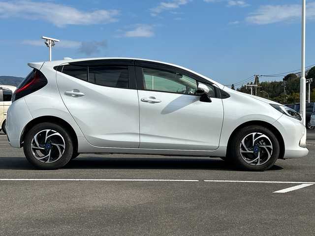 トヨタ アクア Z 佐賀県 2022(令4)年 5.5万km プラチナホワイトパールマイカ 純正10.5インチディスプレイオーディオ/モデリスタ15インチアルミホイール/バックカメラ/ビルトインETC/レーダークルーズコントロール/クリアランスソナー/プリクラッシュセーフティセンス/パーキングサポートブレーキ/ハーフレザーシート/前席シートヒーター/運転席シートヒーター/ステアリングヒーター/LEDヘッドライト/フォグランプ/AC100V