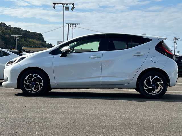 トヨタ アクア Z 佐賀県 2022(令4)年 5.5万km プラチナホワイトパールマイカ 純正10.5インチディスプレイオーディオ/モデリスタ15インチアルミホイール/バックカメラ/ビルトインETC/レーダークルーズコントロール/クリアランスソナー/プリクラッシュセーフティセンス/パーキングサポートブレーキ/ハーフレザーシート/前席シートヒーター/運転席シートヒーター/ステアリングヒーター/LEDヘッドライト/フォグランプ/AC100V