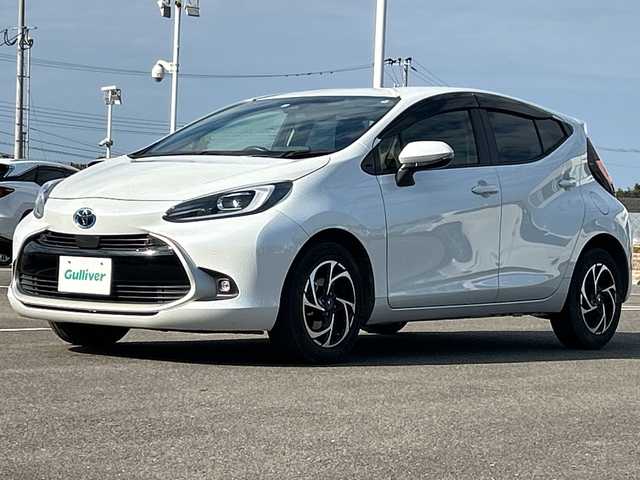 トヨタ アクア Z 佐賀県 2022(令4)年 5.5万km プラチナホワイトパールマイカ 純正10.5インチディスプレイオーディオ/モデリスタ15インチアルミホイール/バックカメラ/ビルトインETC/レーダークルーズコントロール/クリアランスソナー/プリクラッシュセーフティセンス/パーキングサポートブレーキ/ハーフレザーシート/前席シートヒーター/運転席シートヒーター/ステアリングヒーター/LEDヘッドライト/フォグランプ/AC100V
