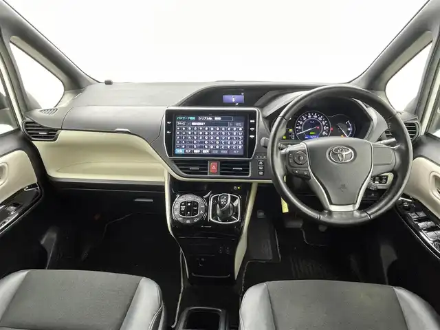トヨタ ノア ハイブリッド Si ダブルバイビー 熊本県 2018(平30)年 4.5万km ホワイトパールクリスタルシャイン ワンオーナー/純正ナビNSZN-Z66T（ＣＤ・ＤＶＤ・フルセグ・ＢＴ・ＳＤ・ｉｐｏｄ・ＵＳＢ）/バックカメラ　/ビルトインＥＴＣ２．０　/両側パワースライドドア　/クルーズコントロール　/前席シートヒーター　/トヨタセーフティーセンス/・プリクラッシュセーフティ/・レーンディパーチャーアラート/・オートマチックハイビーム/横滑り防止/ハーフレザーシート/純正フロアマット/純正１６インチAW/オートライト/LEDヘッドライト/スマートキー/プッシュスタート