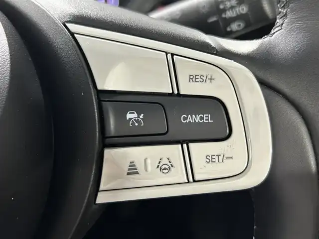 ホンダ フィット e:HEVホーム 佐賀県 2020(令2)年 2.6万km プレミアムサンライトホワイトパール 純正8インチナビ/CD/DVD/フルセグTV/Bluetooth/ホンダセンシング/衝突軽減ブレーキ/路外逸脱抑制システム/踏み間違い衝突軽減ブレーキ/クリアランスソナー/横滑り防止/追従付きクルーズコントロール/ハーフレザーシート/ＬＥＤライト/前方ドライブレコーダー/ビルトインETC/USB入力/電子パーキング/ブレーキホールド/三点エアバック/スマートキー/スペアキー/純正フロアマット/ドアバイザー