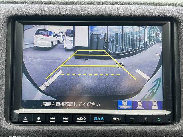 ホンダ ヴェゼル ハイブリッド RS ホンダセンシング 長野県 2019(令1)年 4万km ミッドナイトブルービームM ホンダ純正SDナビ（VXM-195VFEi）/FM・AM・DVD・CD・フルセグTV/Bluetooth Audio/バックカメラ/純正18インチアルミホイール/レーダークルーズコントロール/衝突被害軽減ブレーキ/前後コーナーセンサー/ハーフレザーシート/前席シートヒーター/革巻きステアリング/ワイパーデアイサー/電動パーキング/オートホールド/パドルシフト/LEDヘッドライト/プッシュスタート/スマートキー/スペア1本/ドアバイザー/ETC/取扱説明書