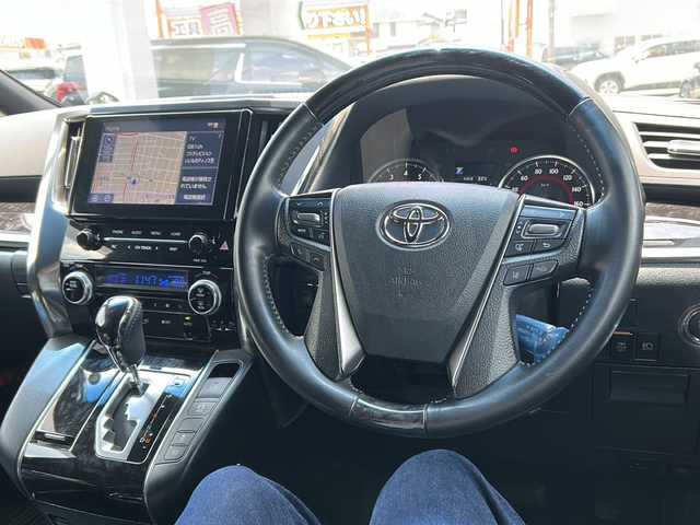 トヨタ アルファード S タイプゴールド 埼玉県 2020(令2)年 9.2万km ブラック ワンオーナー/メモリナビ/フルセグテレビ/バックカメラ/フリップダウンモニター/TRDエアロ（Fスポイラー/Rアンダースポイラー）/全車速追従機能付クルーズコントロール/レーンアシスト/クリアランスソナー/ヒルスタートアシスト/本革巻きステアリング/プッシュスタート/両側パワースライドドア/イージークローザー/ETC/DVDナビ/運転席エアバッグ/助手席エアバッグ/サイドエアバッグ/ＡＢＳ（アンチロックブレーキ）/サイドインパクトバー/ブレーキアシスト/衝突安全ボディ/EBD/横滑り防止装置/衝突防止装置/車間距離制御システム/盗難防止装置/エアコン：デュアルエアコン/テアリングホイールテレスコピック機構/ステアリングホイールチルト/アルミホイール/ＵＶカットガラス/プライバシーガラス/空気清浄機/前席左右独立温度調整式エアコン/後席左右独立温度調整式エアコン