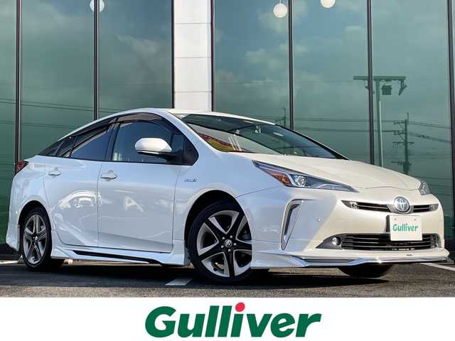 トヨタ プリウス Sツーリングセレクション 福岡県 2019(令1)年 7.1万km ホワイトパールクリスタルシャイン 純正９型メモリナビ/Bluetooth/CD/DVD/フルセグＴＶ/バックモニター/モデリスタエアロ/前後ドライブレコーダー/ビルトインＥＴＣ/前席シートヒーター/レーダークルーズコントロール/コーナーセンサー/スマートキー/スペアキー有/プッシュスタート