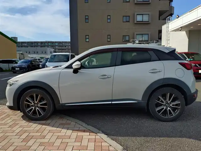 マツダ ＣＸ－３ XD ツーリング 新潟県 2015(平27)年 9.2万km セラミックM (株)IDOMが運営する【じしゃロン新潟店】の自社ローン専用車両になります。/こちらは現金またはオートローンご利用時の価格です。自社ローンご希望の方は別途その旨お申付け下さい/純正SDナビ/Bluetooth接続可能/USB/AUX接続可能/バックカメラ/ETC/プッシュスタート/クルーズコントロール/ハーフレザーシート/アクティブドライビングディスプレイ/ブラインドスポットモニタリング/スマートシティーブレーキ/スマートキー/スペアキー×１/取扱説明書