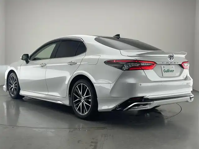 トヨタ カムリ G レザーパッケージ 愛知県 2021(令3)年 1.6万km プラチナホワイトパールマイカ メーカーナビ　純正９イ型DA　全方位カメラ　フルセグTV　パノラマムーンルーフ　モデリスタ　BSM　HUD　JBLサウンド　黒革シート　追従クルコン　ETC2.0　LEDオートライト　フォグ　衝突軽減　車線逸脱　禁煙車